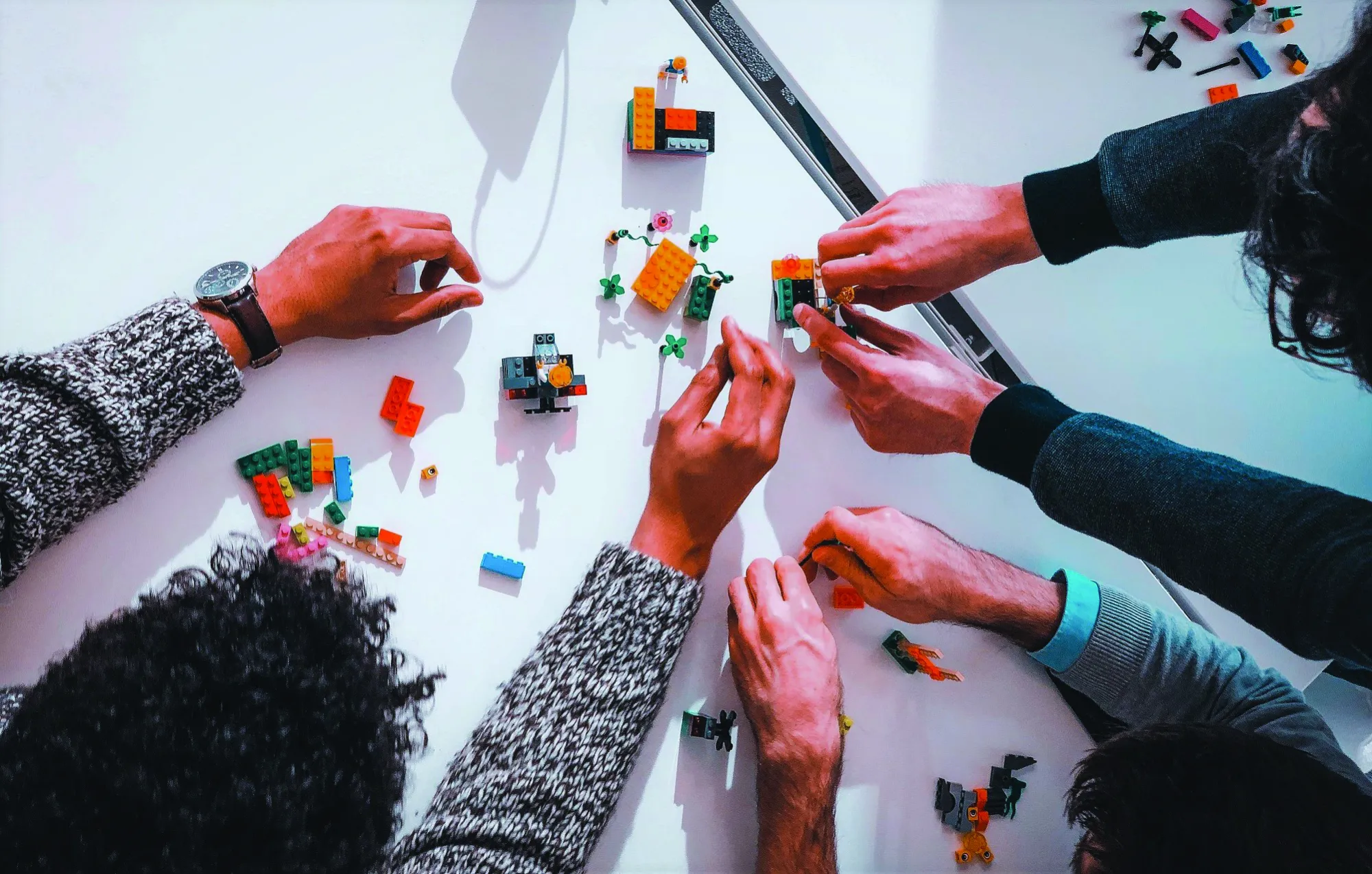 Participants building LEGO® models together